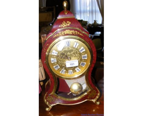 A simulated boulle style striking bracket clock by Garrard