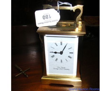 A brass presentation carriage clock by The Chester Carriage Clock Company