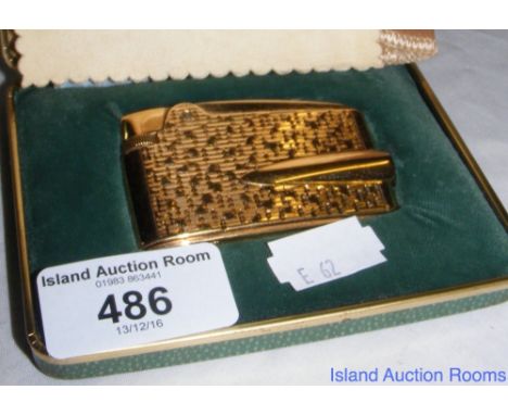 A 9ct gold cased Ronson lighter in original presentation box