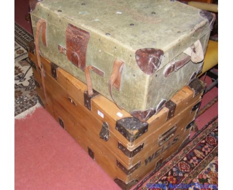 A metal bound pine trunk and a canvas and leather bound ditto