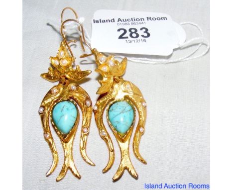 A pair of decorative turquoise and seed pearl drop earrings