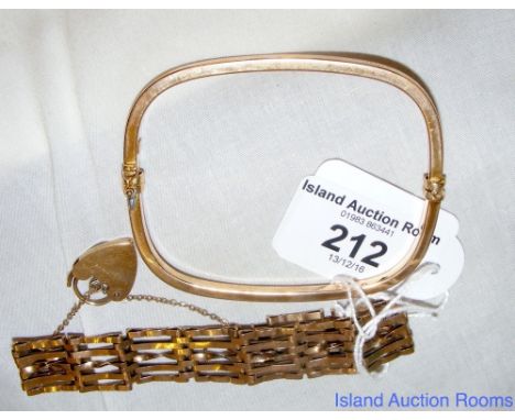 A 9ct gold five bar gate bracelet with padlock clasp and a 9ct gold bangle