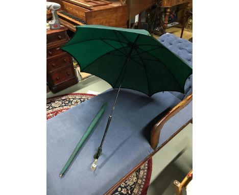 A vintage parasol in an Everest green shade by Paragon S Fox &amp; Co Ltd, handle has racing trinkets attached to it, complet