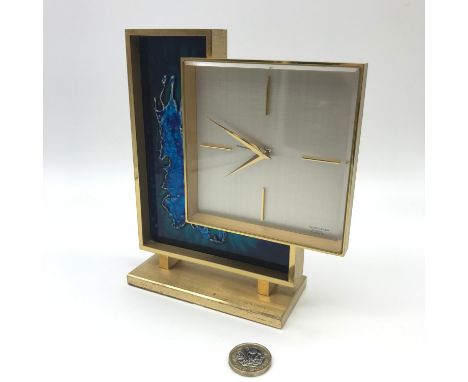 A Vintage Favre- Leuba 8 days 15 jewel alarm mantel clock, Brass body with blue enamel design. Measures 17x14.5x5cm 