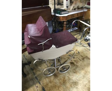 A Vintage dolls pram 