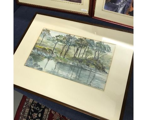 Original watercolour depicting trees reflecting on the waterside. Signed Joan M Falla, Frame measures 47X64CM 