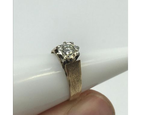 A Ladies London 9ct gold ring set with a large round cut diamond, Has 0.44ct diamond setting, 10/10 sparkle. No Inclusions. R