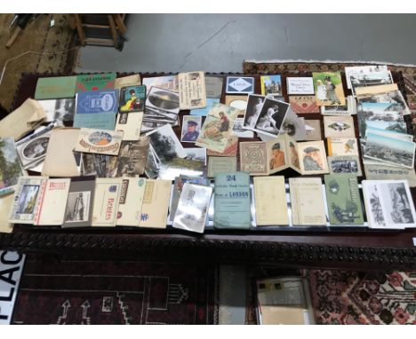 A Large collection of vintage unused postcards album souvenir books and loose postcards. Also includes photo books and Pears 