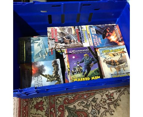 A Crate of vintage Commando comics. 