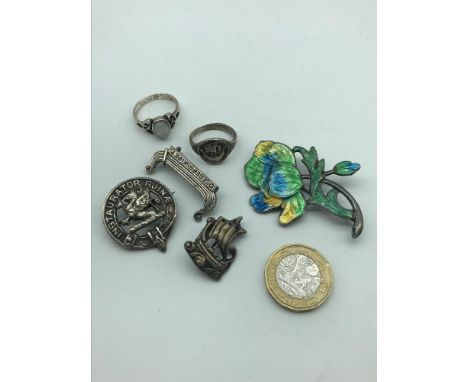 A Lot of silver jewellery which includes Norwegian viking boat ring &amp; 2 brooch, Silver and enamel flower brooch. 