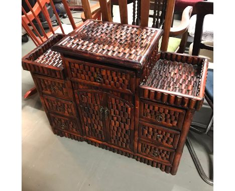 An Oriental style console unit. Measures 70x87x33cm 