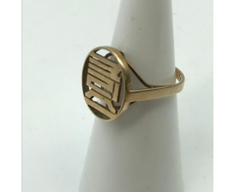 An Oriental 15K gold ring, Ring size I, Weighs 1.78Grams 