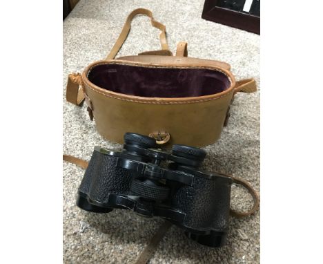 A Vintage set of Ross, London Stereo prism binoculars with carry case. (Power=7 Field 9 1/2) Stepnada, G.H.Wilson Redlands Co