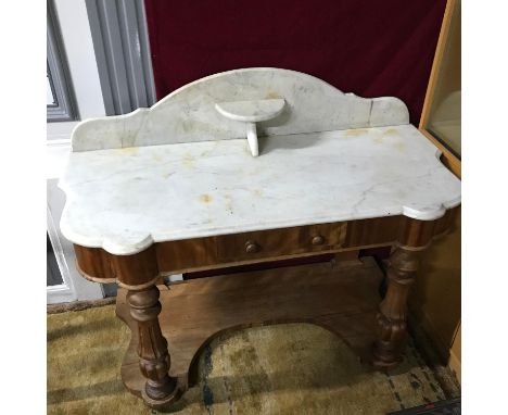 A Victorian Console table, Table top is made of solid marble. Originally used as a wash stand. Has single under drawer and sh