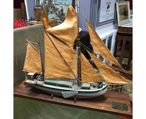A Vintage model sailing barge on a wooden display stand, Brass plaque engraved "Thames Sailing Barge Lady Charlotte Circa 190