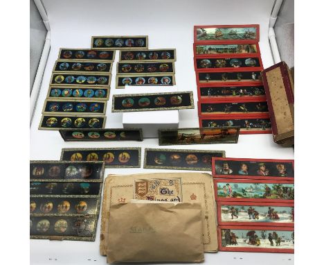 A Collection of Antique magic lantern slides. Showing various comical characters and transport. Together with various loose s