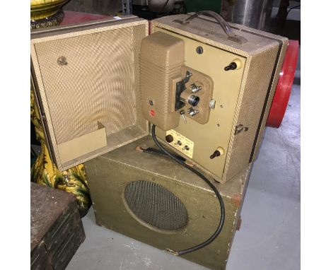A Vintage Kodak eight-500 projector together with a Wharfendale Speaker. 