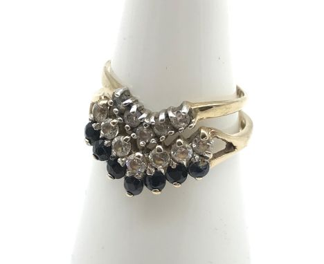 Two 9ct gold ladies wish bone rings set with clear stones and black stones. Ring size L (BLACK AND CLEAR STONE) Small one siz