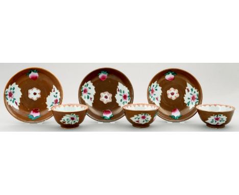 A SET OF THREE CHINESE FAMILLE ROSE BATAVIAN TEA BOWLS AND SAUCERS, 18TH C with cafe au lait ground, saucer 13.5cm diam Sauce