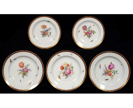 A SET OF FIVE BERLIN DISHES, EARLY 19TH C&nbsp; in two sizes, painted with a loose bouquet and moth in formal gilt brownish r