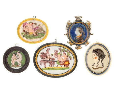 FIVE PRATTWARE PLAQUES, C1790-1820&nbsp; two moulded with Bacchus, the others with a classical head or commemorative portrait
