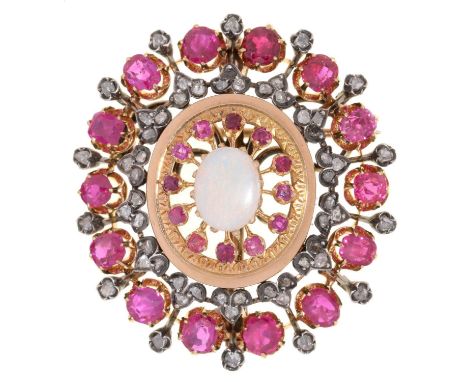 A RUBY, DIAMOND AND OPAL BROOCH-PENDANT&nbsp;in gold, 40mm, 18g Good condition