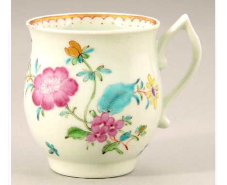 A WORCESTER FAMILLE ROSE BELL SHAPED COFFEE CUP, C1765-70&nbsp;&nbsp;painted with flowers and insects, 6.5cm h Slight spot of