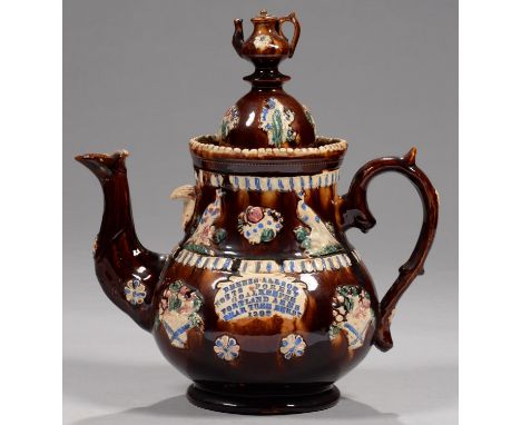 FOOTBALL INTEREST.&nbsp; A&nbsp; BARGEWARE TEAPOT AND COVER, DATED 1902&nbsp;sprigged with birds, baskets of flowers and rose