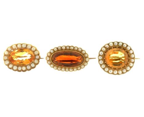 THREE VICTORIAN CITRINE AND PEARL BROOCHES, MID 19TH C&nbsp; in gold, 256mm and smaller, 14g Good condition