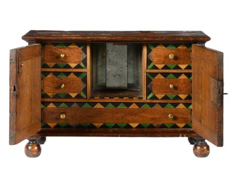 &nbsp;MINIATURE FURNITURE.&nbsp; &nbsp;A WALNUT AND GEOMETRIC LINE INLAID TABLE CABINET the architectural fitted interior of 