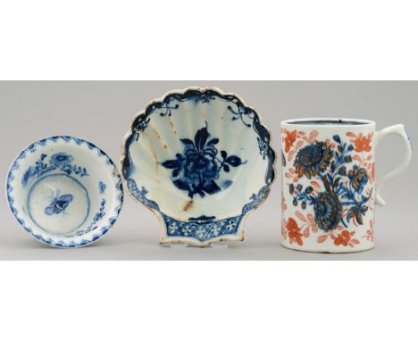 A LOWESTOFT BLUE AND WHITE SCALLOP SHELL SHAPED DISH, C1765&nbsp; painted to the centre with a peony in scroll and flower bor