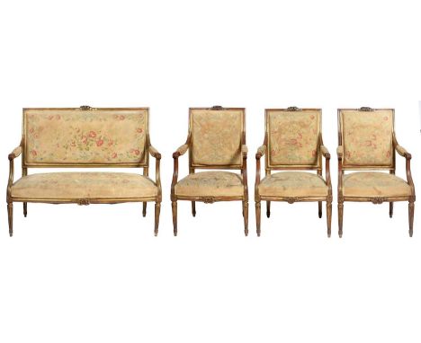 A FRENCH GILTWOOD SUITE IN LOUIS XVI STYLE, EARLY 20TH C&nbsp; the back and seat rail with carved ribbon cresting,&nbsp; upho