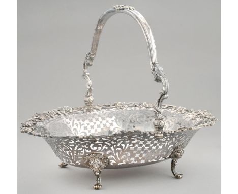 A GEORGE III PIERCED SILVER BASKET with finely cast and applied openwork border of trailing roses and other flowers, C scroll