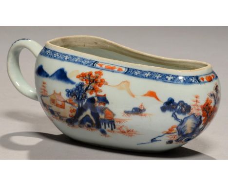 A CHINESE IMARI&nbsp; CHAMBER OR COACH POT (BOURDALOUE), 18TH C decorated with island scenes beneath diaper border, 15cm l Ha