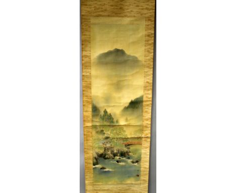 A 19TH CENTURY SIGNED CHINESE HANGING SCROLL PAINTING ON SILK, with ivory end pieces and within a patterned silk mount, the p