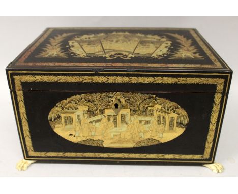 A GOOD QUALITY 19TH CENTURY CHINESE LACQUERED WOOD RECTANGULAR TEA CADDY, with a fitted interior pewter container the hinged 