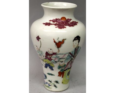 A GOOD 19TH CENTURY CHINESE FAMILLE ROSE PORCELAIN VASE, painted with a lady and playing boys in a fenced garden setting, 8.7