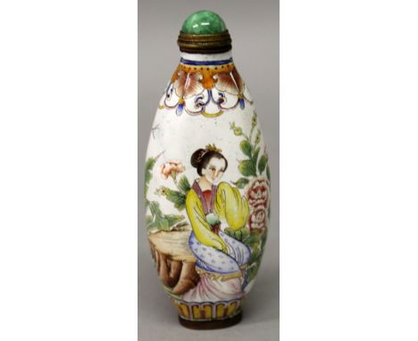 A CHINESE CANTON ENAMEL SNUFF BOTTLE & STOPPER, the sides of the oval form body decorated with a seated lady and the Immortal