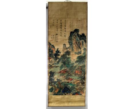 A CHINESE HANGING SCROLL PICTURE, decorated with calligraphy above a mountainous landscape scene, the picture itself 49.25in 