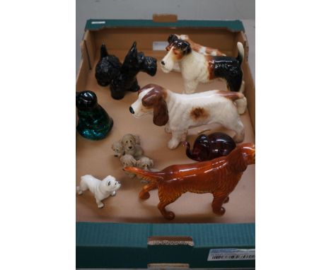 Collection of ceramic & glass dogs 