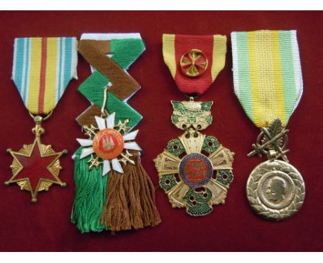 South Vietnamese medal group (4) including: National Order of Vietnam 3th class (Bao-Quôc Huâ-Chu'o'ng), knight, gilt finish 