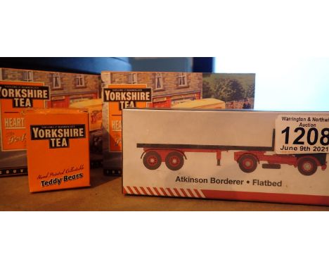 Three boxed vintage type model vehicles and a Typhoo tea bear. P&amp;P Group 1 (£14+VAT for the first lot and £1+VAT for subs