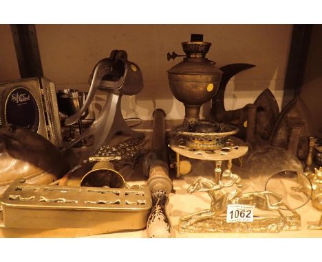 Shelf of mixed copper, brass and silver plated items including an antique oil lamp. Not available for in-house P&amp;P, conta