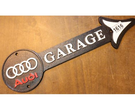Cast iron Audi Garage arrow sign, L: 44 cm. P&amp;P Group 2 (£18+VAT for the first lot and £3+VAT for subsequent lots) 