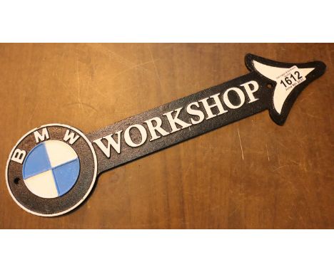 Cat iron BMW Workshop arrow sign, L: 46 cm. P&amp;P Group 2 (£18+VAT for the first lot and £3+VAT for subsequent lots) 