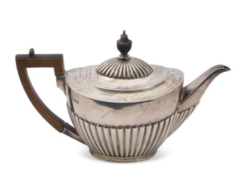 Victorian tea pot of three-quarter fluted oval form, treen finial and angular handle, Sheffield 1889 by Mappin Bros (William 