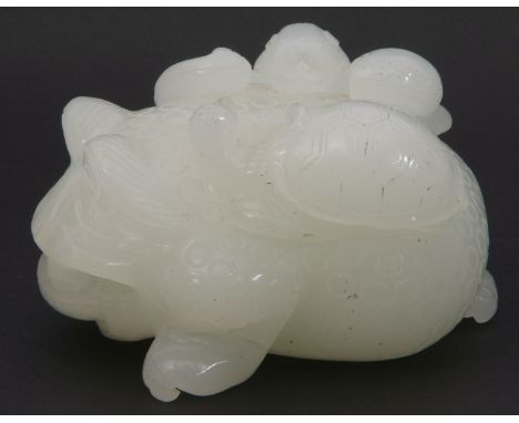 Large pale celadon jade model of a frog with tortoise and other beasts on its back, 9cm long