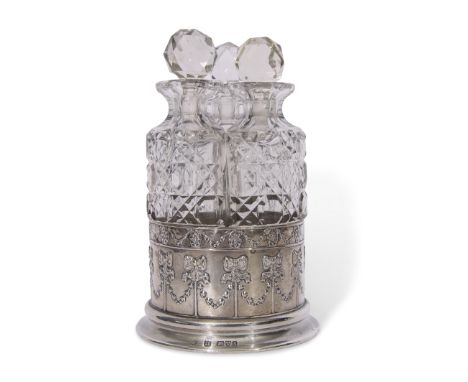 Silver cased three bottle decanter set, glass bottles and stoppers in excellent condition, James &amp; William Deakin, Cheste