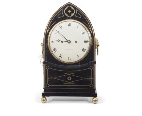 Lancet shaped bracket clock, Parkinson &amp; Frodsham of London, inlaid throughout with cut brass stringing, circular enamell