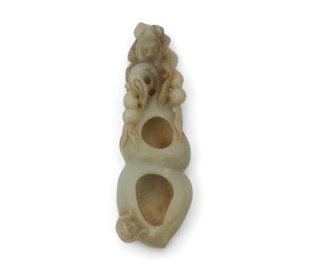 Chinese jade brush washer, the jade with some russet occlusions carved with a monkey at one end and mythical beast at the oth